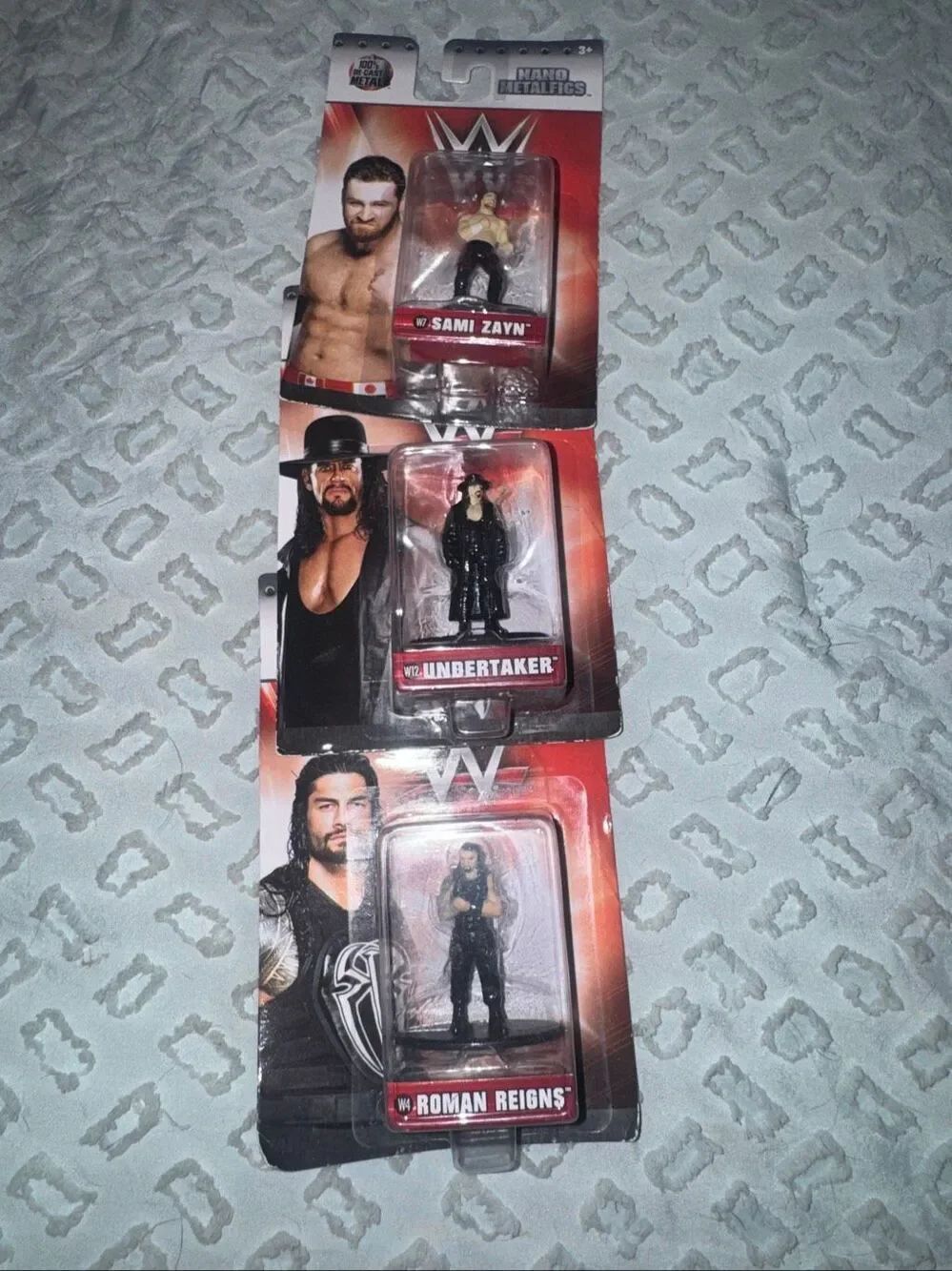 NWT Wrestling mini characters. Roman reigns and undertaker